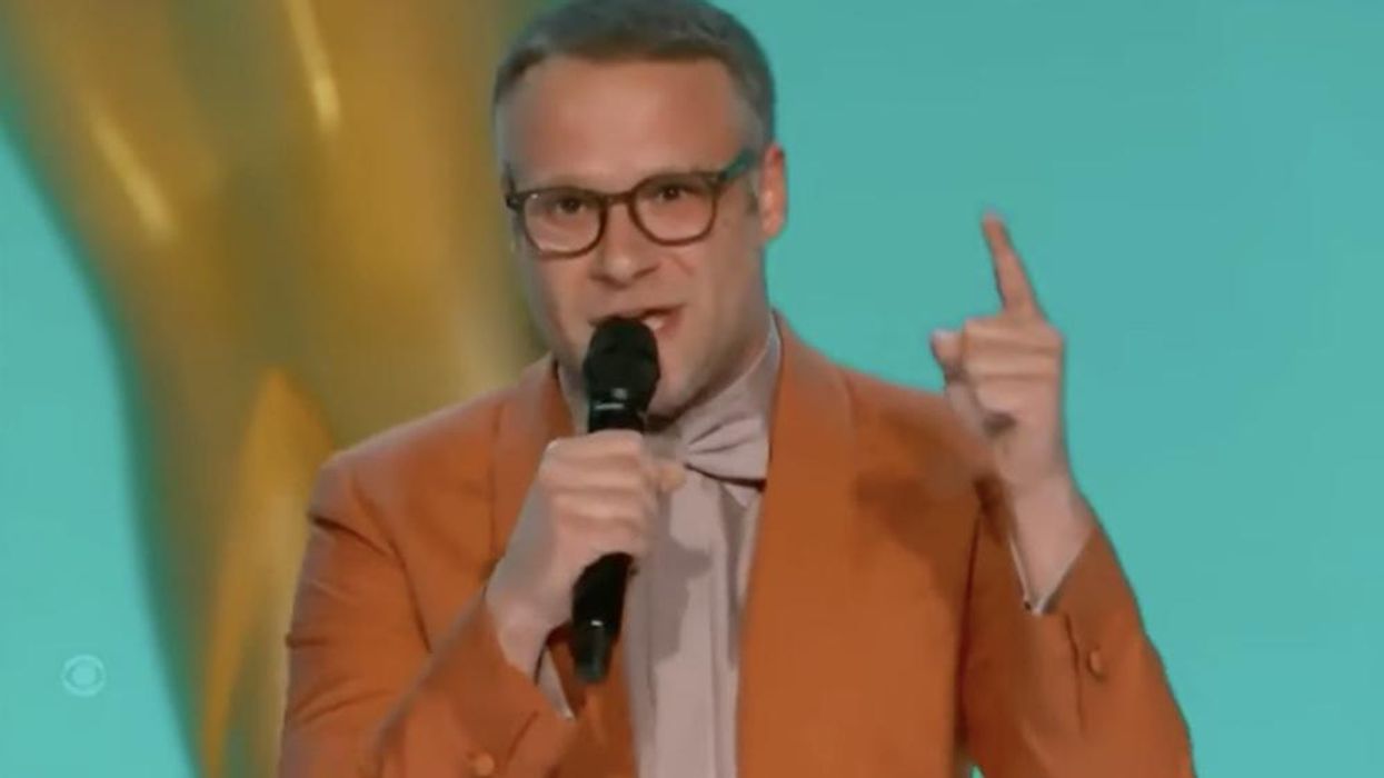 Maskless celebs gather for Emmys while LA County requires masks for indoor events. Seth Rogen points out hypocrisy of having event in 'hermetically sealed tent' and claiming to be outdoors.