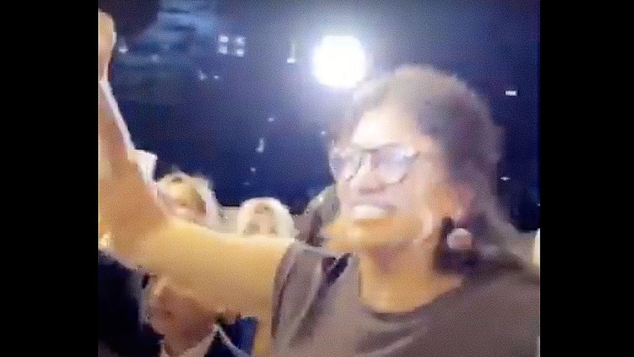 Maskless Rashida Tlaib dances wildly at crowded wedding as she blasts Rand Paul for urging Americans to resist future lockdowns