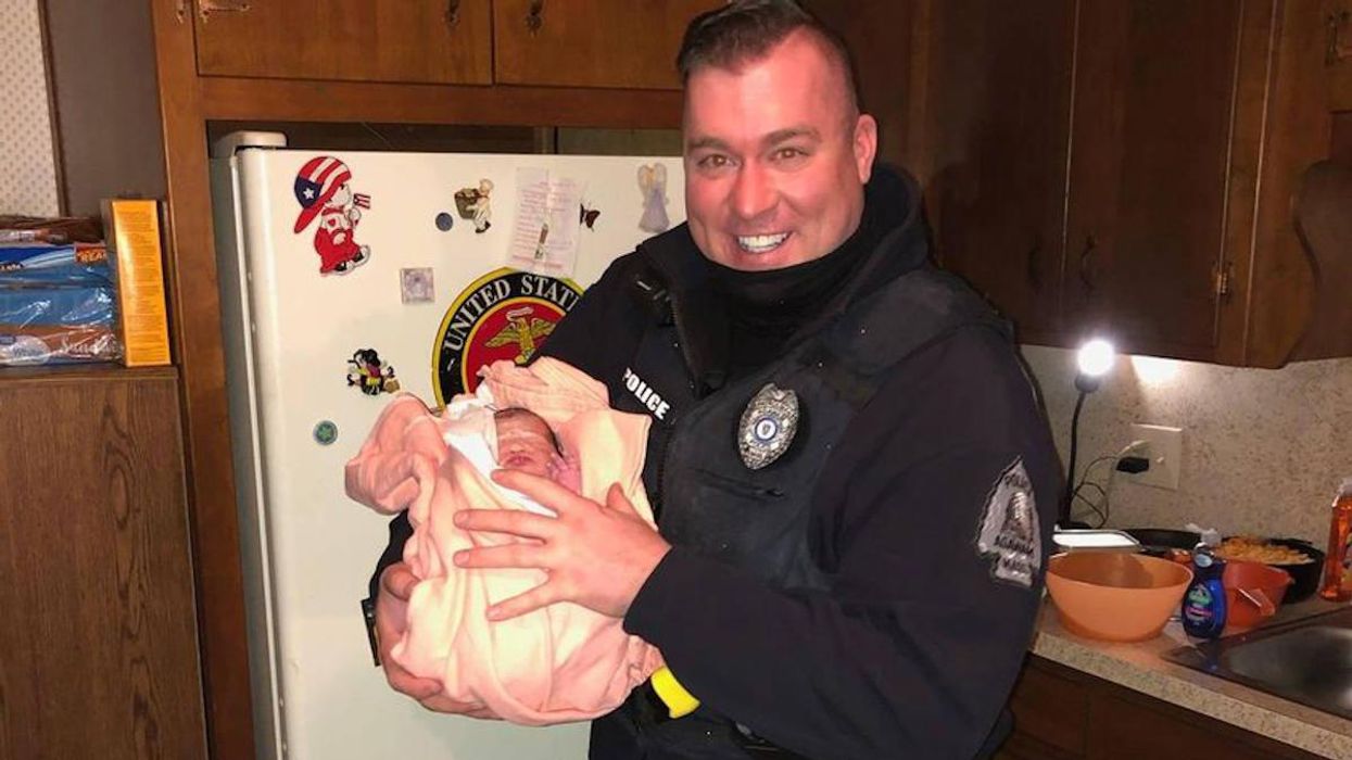 Massachusetts cop rings in the New Year by helping woman in labor deliver a 'healthy baby girl'