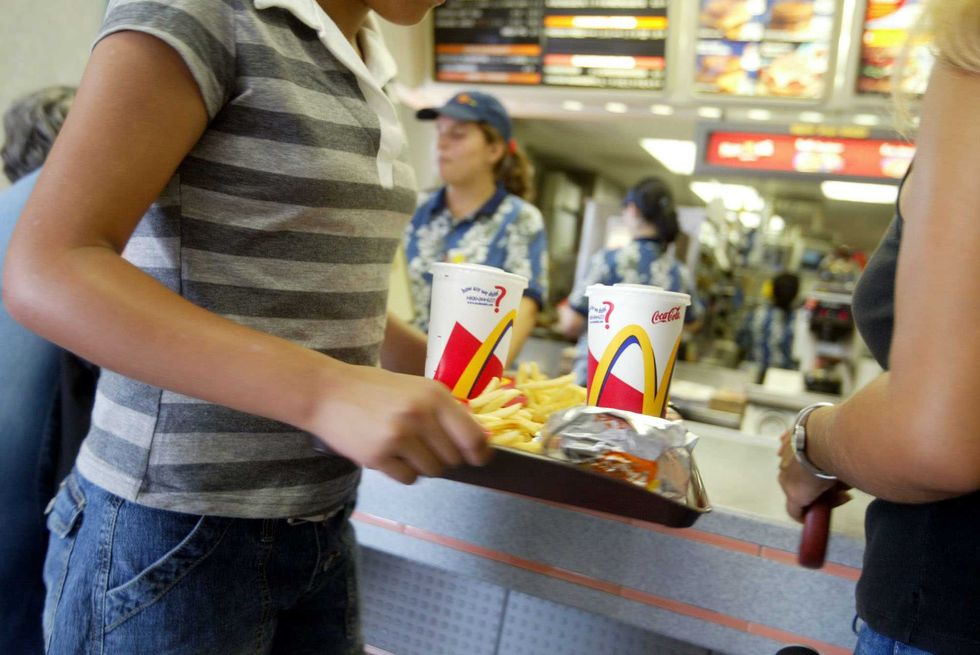 McDonald's manager faces 5 years in prison after posting video of herself contaminating french fries, cops say