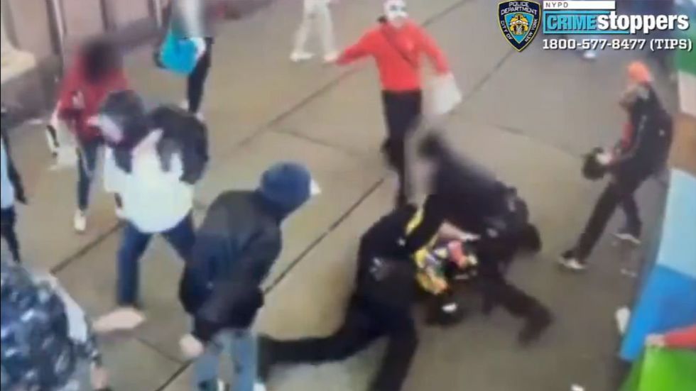 Migrant mob kicks‚ punches NYPD cops in vicious attack — then 4 get released without bail