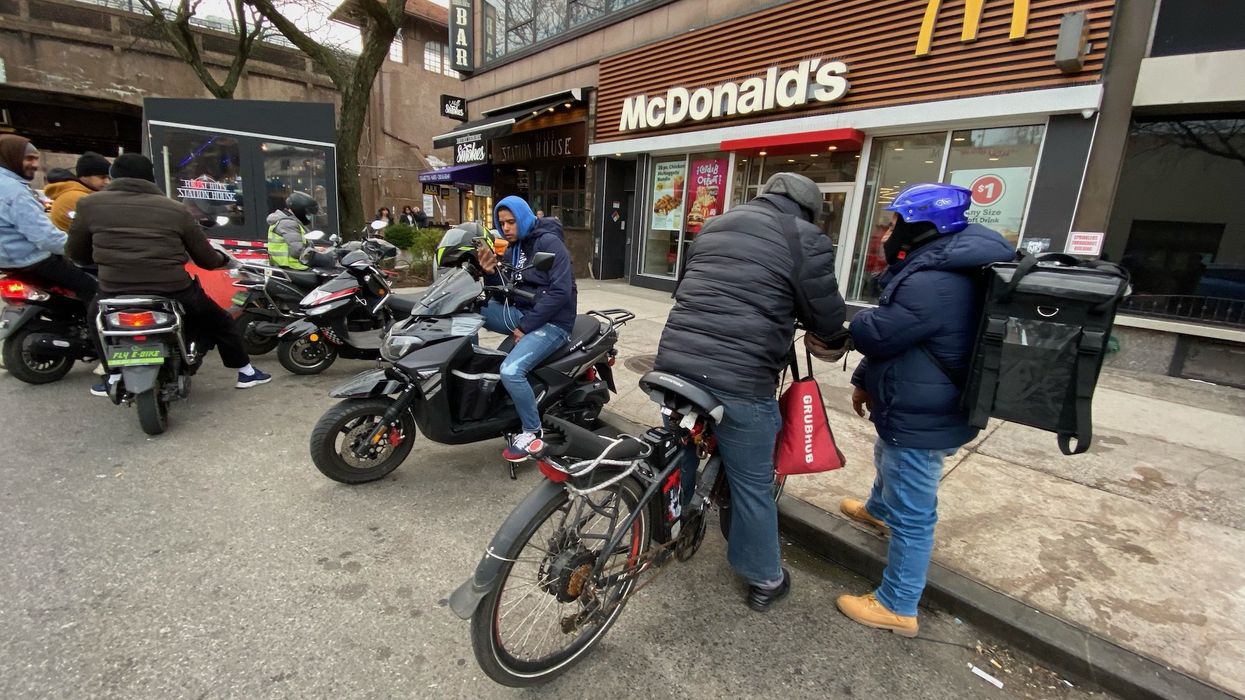Migrant workers take over block in NYC with e-bikes for food delivery and night watchman, 'shocked' locals say