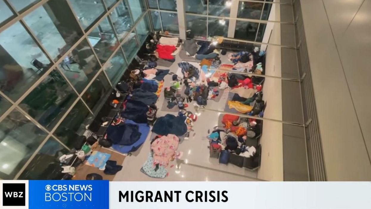 Migrants are sleeping on the floor at Boston airport due to sanctuary state's overwhelmed shelter system