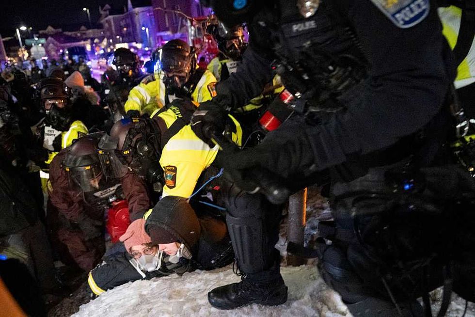 Minnesota police FINALLY fight back: Cops hit violent anti-ICE mob with tear gas, arrests outside hotel supposedly housing feds