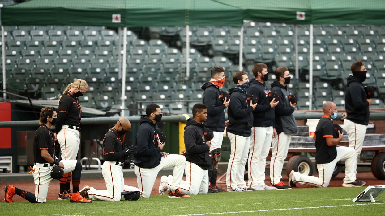 MLB manager, players kneel for national anthem, sparking Trump criticism