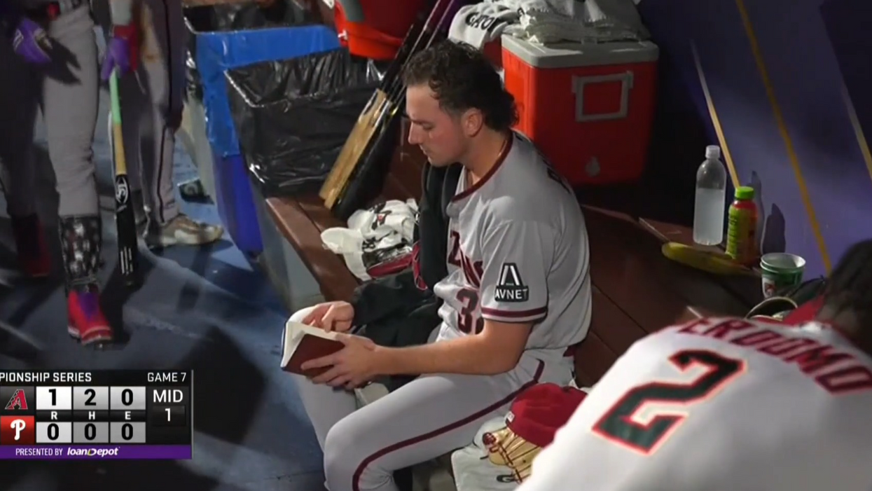 MLB pitcher goes viral for seemingly reading the Bible in dugout before Game 7 win that sent team to World Series
