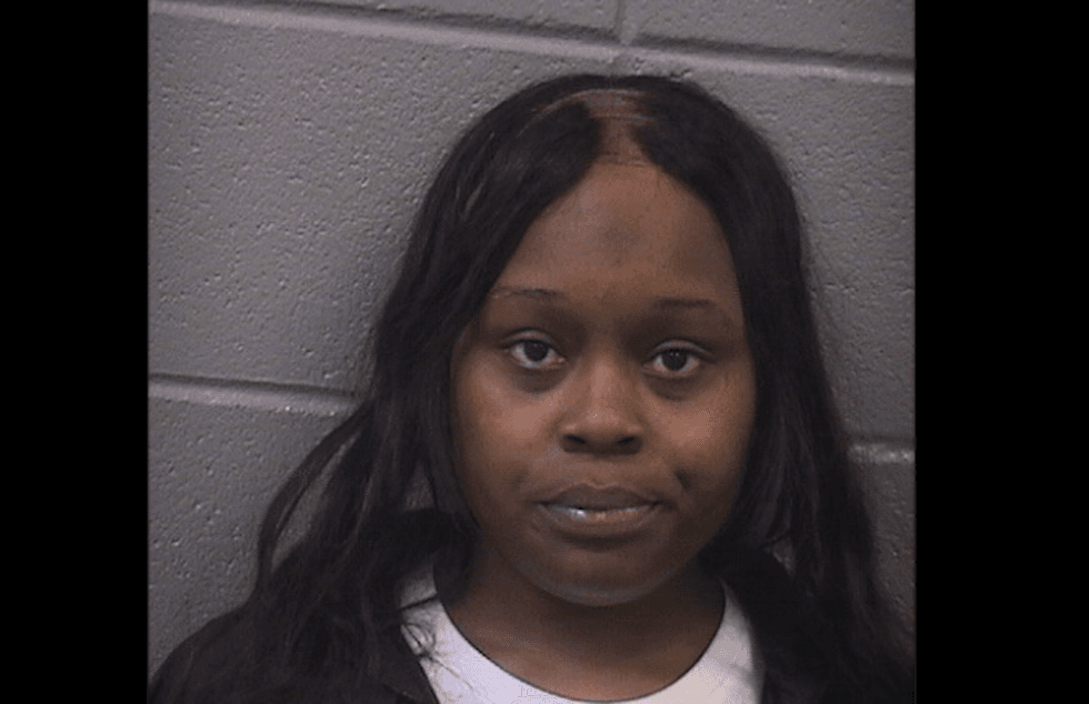 Mother, 39, accused of pulling gun on children outside Chicago elementary school, making threats