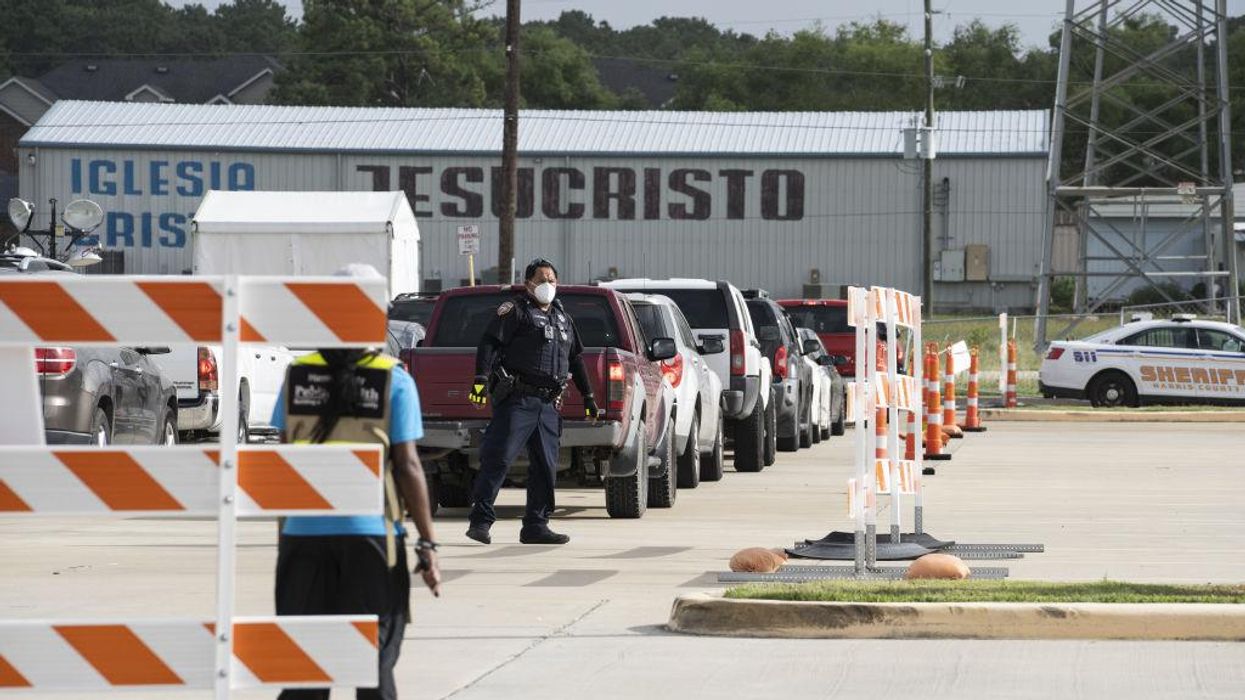 Mother charged with endangering a child after COVID-positive son found in trunk of car at testing site because she wanted to 'prevent herself from getting exposed': Court docs