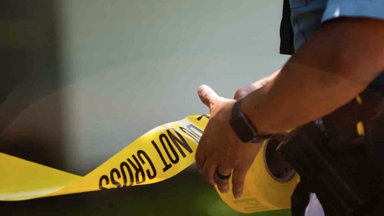 Mother fights armed intruder who pointed gun at her children, takes gun away from him