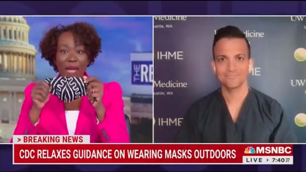 MSNBC's fully immunized Joy Reid ignores CDC mask guidance, claims she still wears two masks while jogging outdoors. Her doctor guest tells her it's unnecessary. 