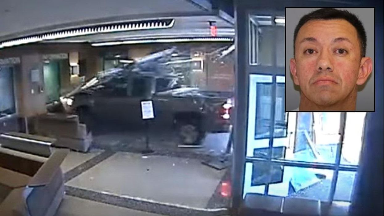 'Paranoid' driver accused of intentionally crashing pickup truck into police station 'in order to be heard': Video