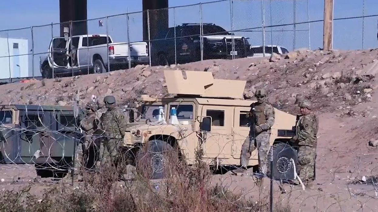 National Guard and state troopers swap out red carpet for razor wire, stand ready at Texas border