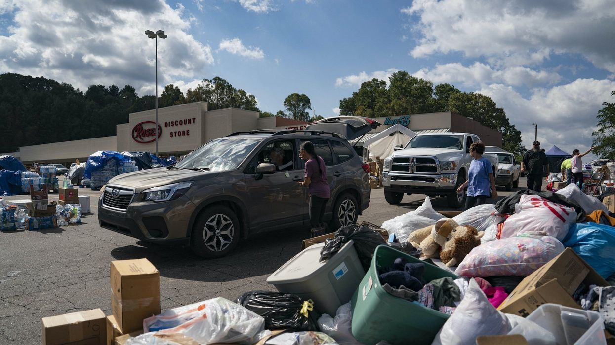National Guard helicopter crew grounded for flying low over hurricane relief depot and scattering supplies