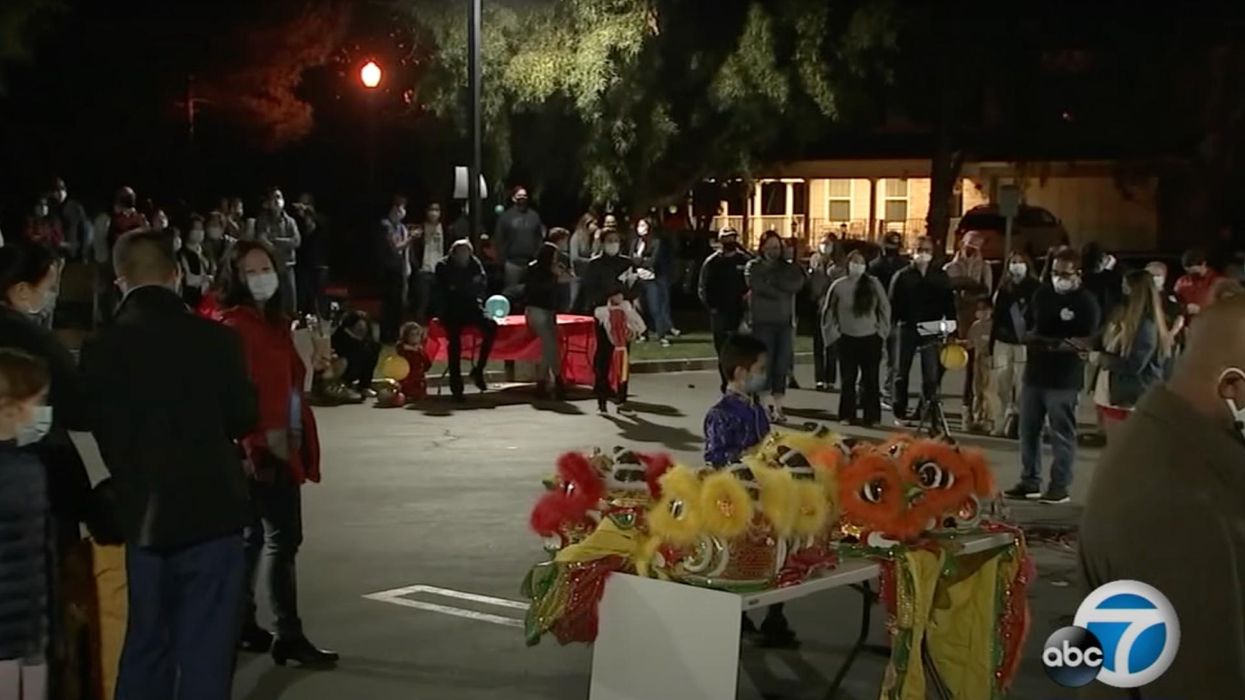 Neighborhood bands together to guard Asian-American family's home after months of racist attacks