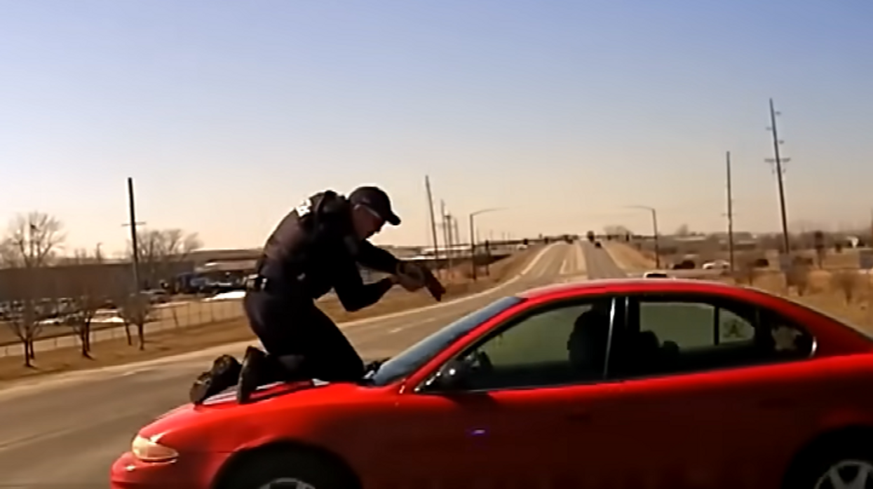 Nerve-racking bodycam video shows cop clinging to runaway car during wild police chase