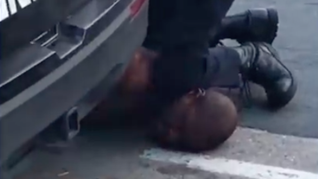 New video angle shows two other officers on George Floyd's back while third officer kneels on his neck
