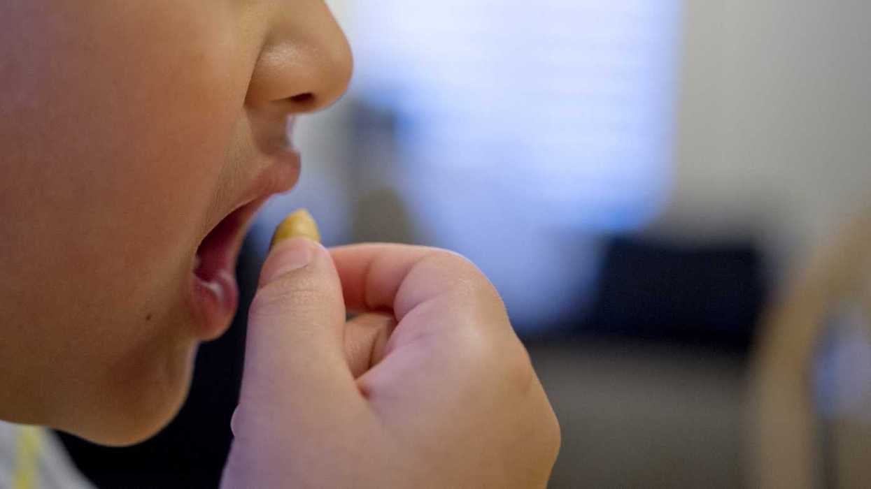 New York woman charged with manslaughter after her baby CHOKES to death on popcorn kernels