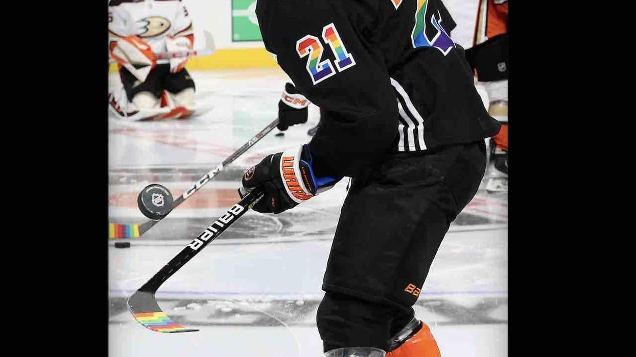 NHL player, citing his faith, doesn't warm up with team wearing LGBTQ colors before 'Pride Night' game. ESPN writer who covered controversy bashes player on Twitter.