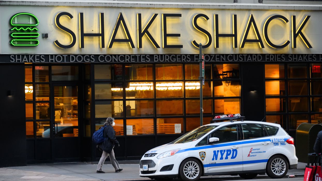 NYPD car in front of Shake Shack
