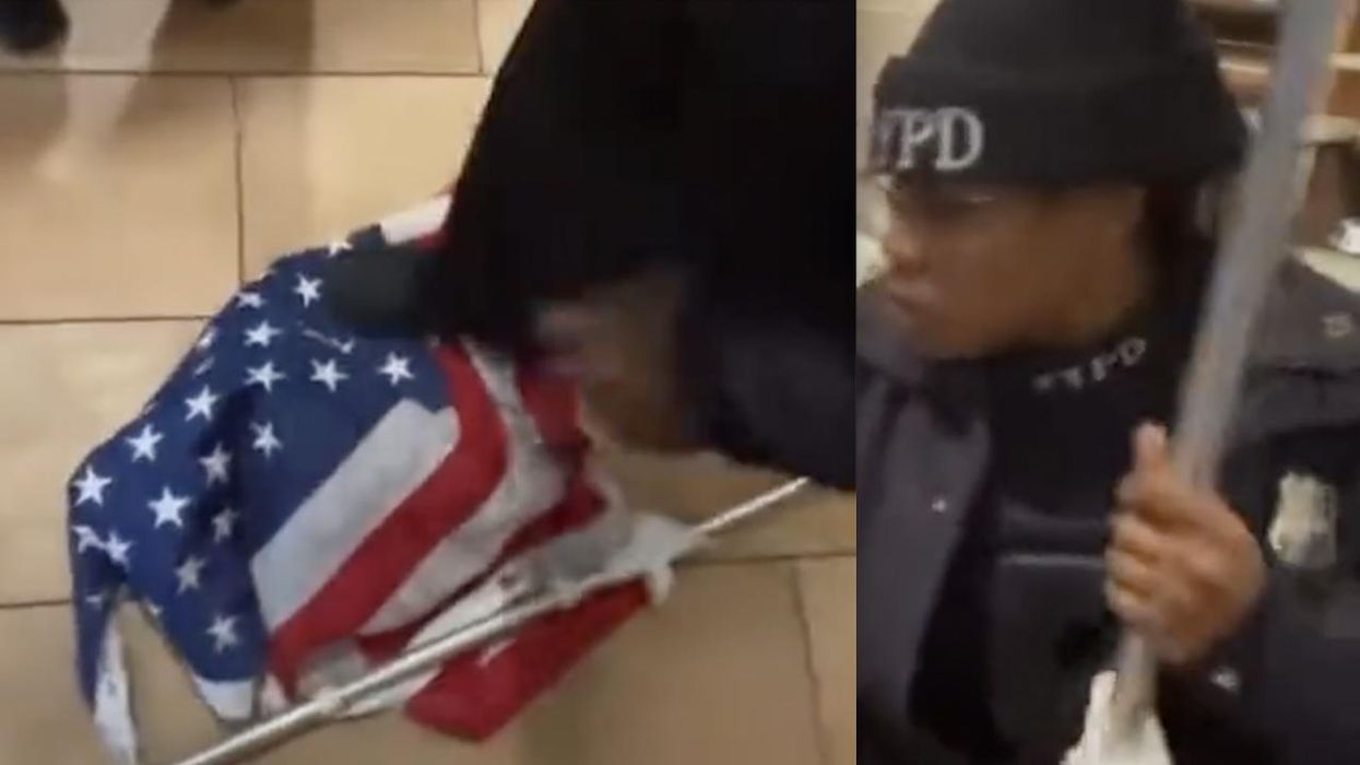 NYPD officer appears to purposely step on US flag after ripping pole from 'proof of vaccine' protester, throwing pole on ground