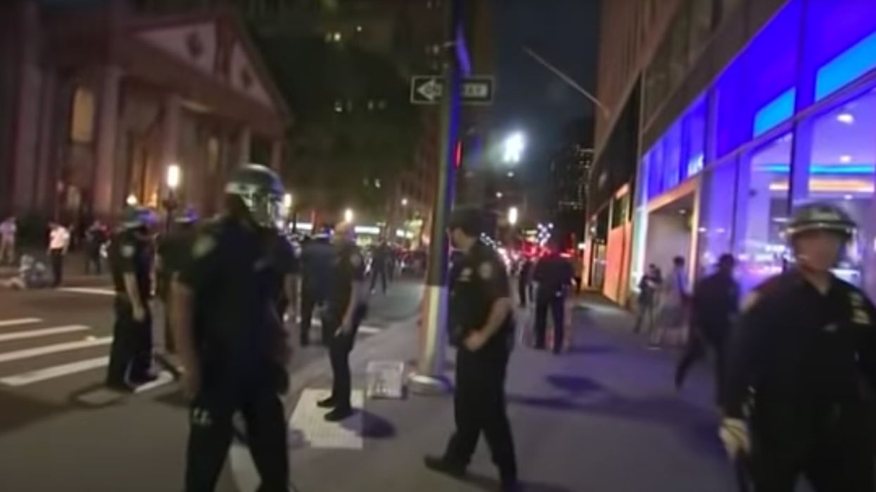 NYPD officers shove AP journalists, force them to stop covering protests