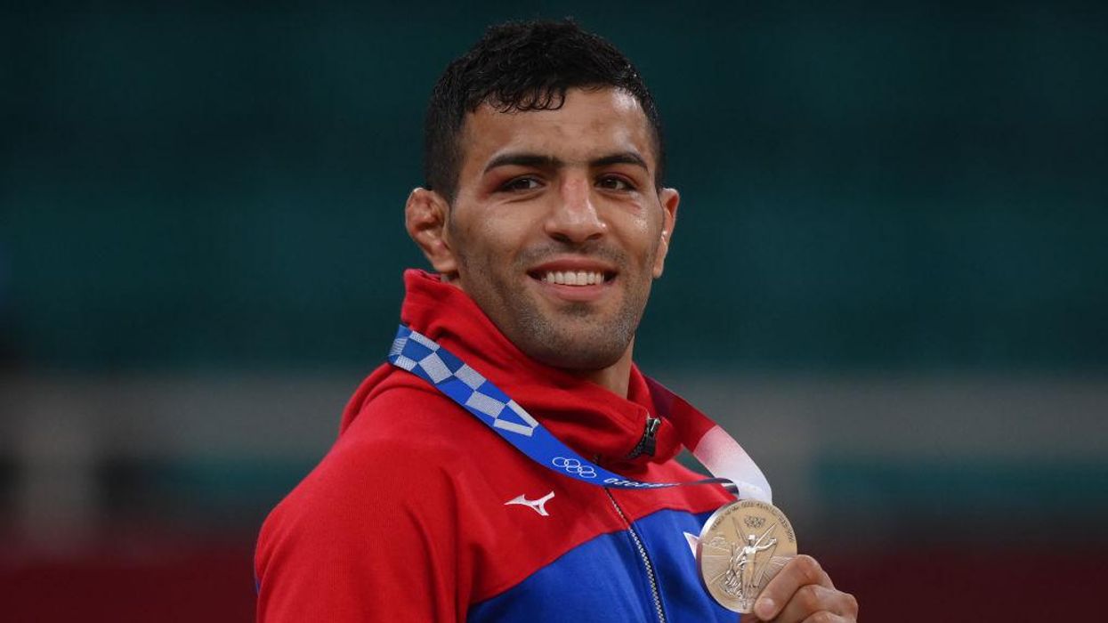 Olympic silver medalist, Iranian defector dedicates medal to Israel to protest anti-Semitism