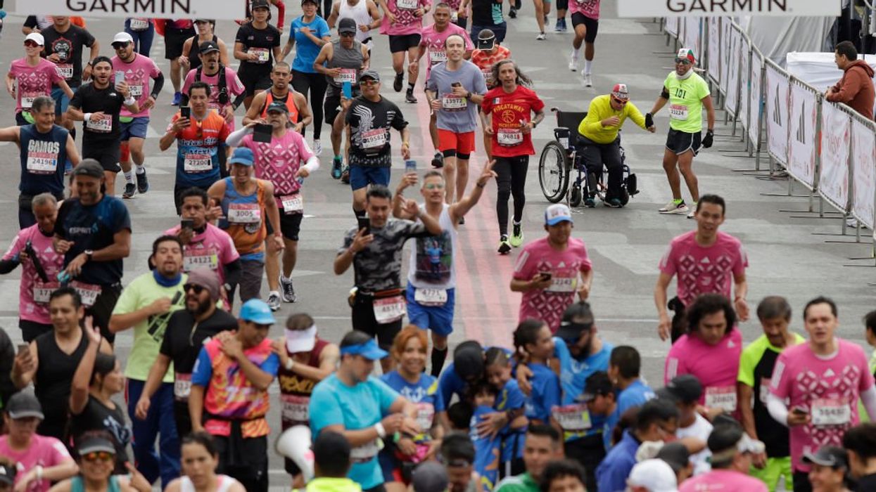 One-third of all Mexico City marathon participants disqualified after some allegedly hop on vehicles to avoid parts of the grueling race