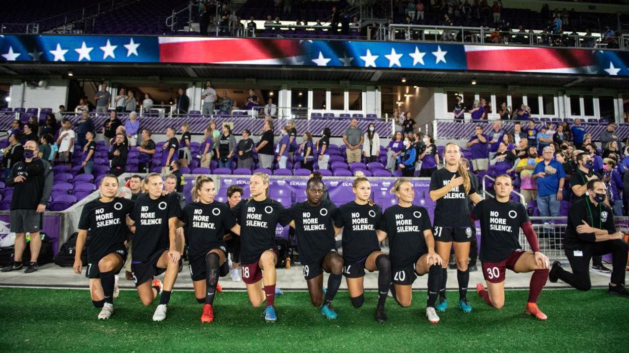 Orlando Pride women's soccer team apologizes for removing 'GAY' banner after players flood comments of complaint post