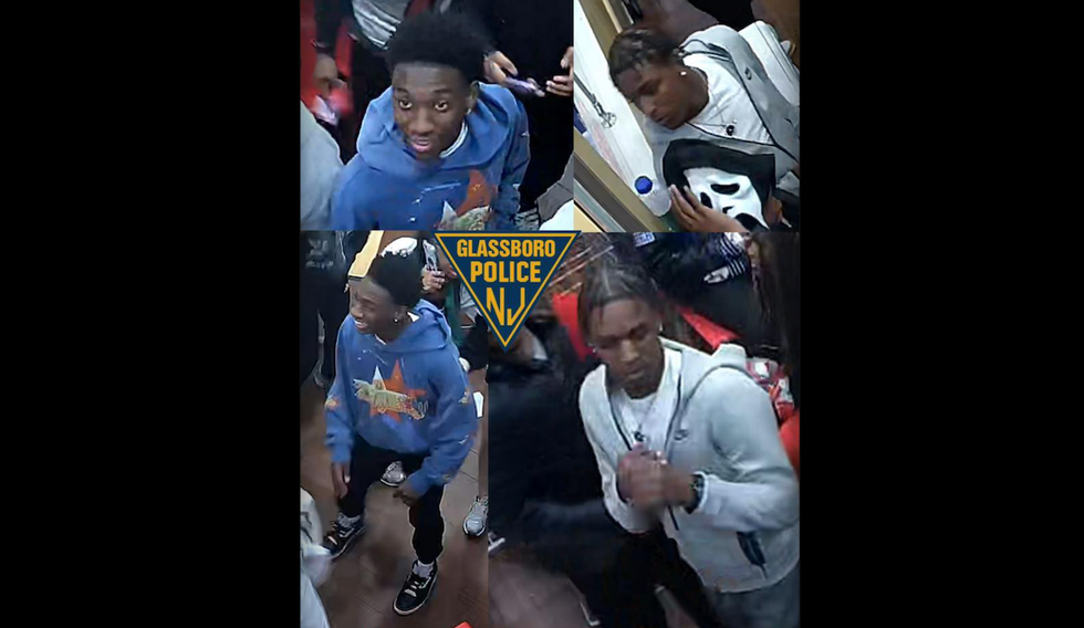 Pair of punks caught on video chucking chair at cops — hitting one in back of head — during Domino's Pizza brawl: Police