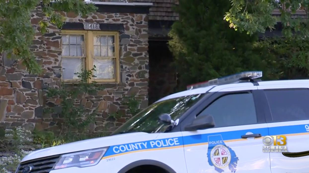 Passerby sees grisly display, thinks it's a 'Halloween decoration.' Turns out, it's a real dead body.