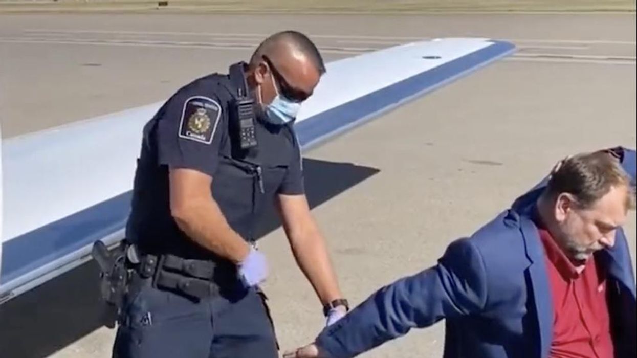 Pastor arrested by 'Gestapo' police on airport tarmac issues warning to Americans: Soviet-style tyranny is 'coming for you' if you don't rise up