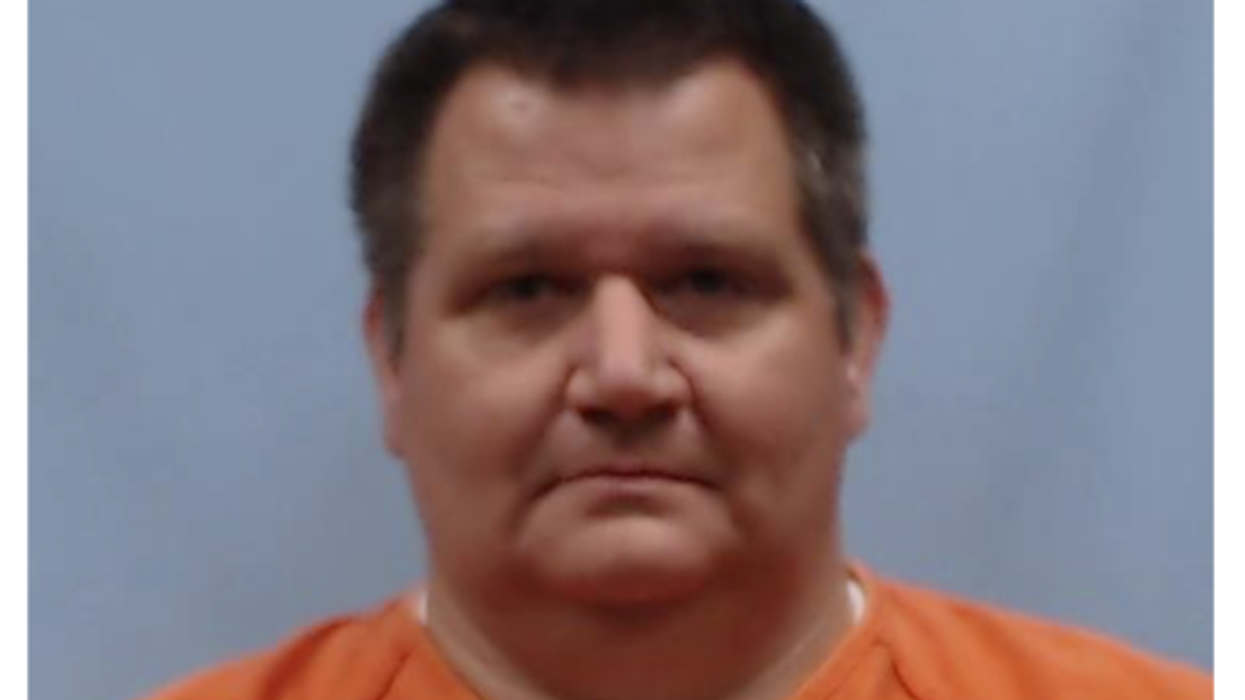 Pastor hit with 100 counts of possessing, distributing child pornography
