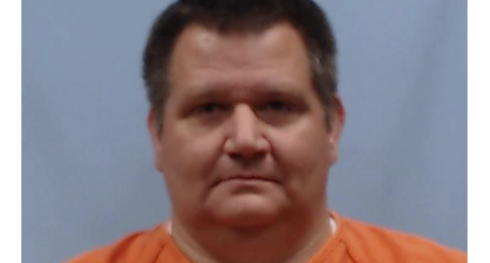 Pastor hit with 100 counts of possessing, distributing child pornography