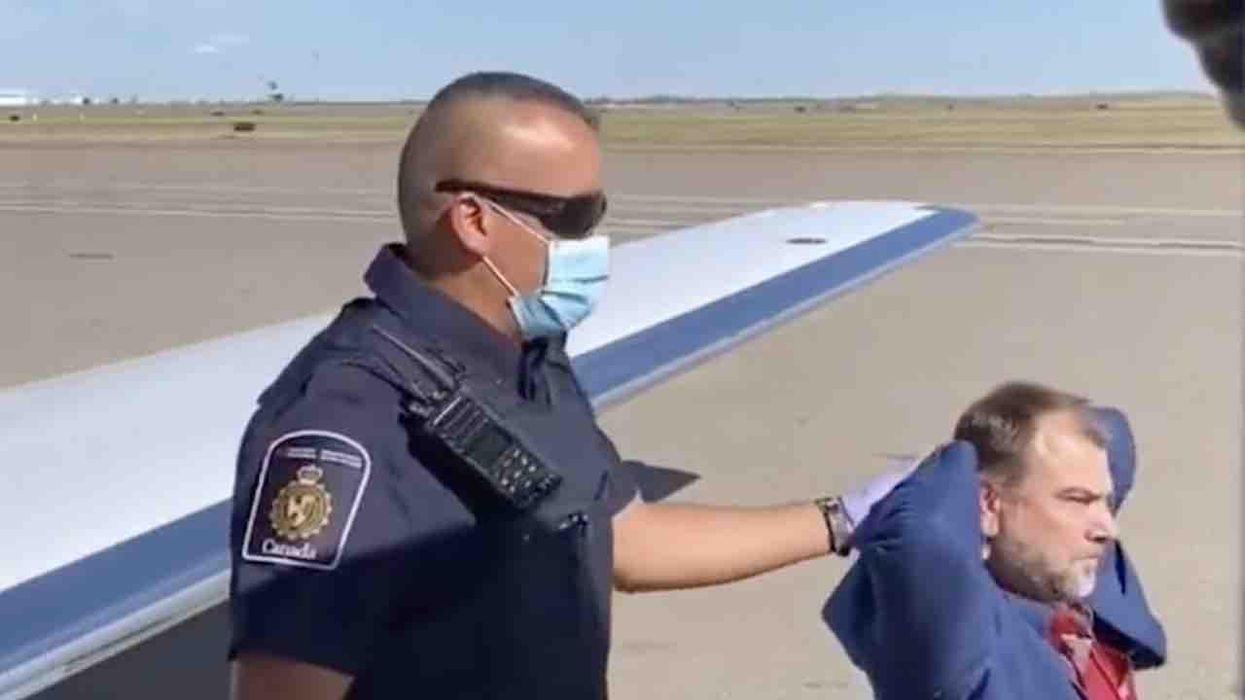 Pastor who kicked out COVID-enforcing 'Nazi' cops from his church earlier this year is arrested again — this time on airport tarmac