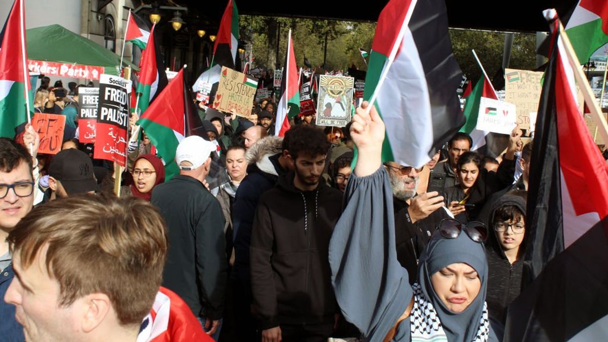 'Israel burn in hell': Transgender refugee at pro-Palestine rally charged after carrying anti-Semitic placard