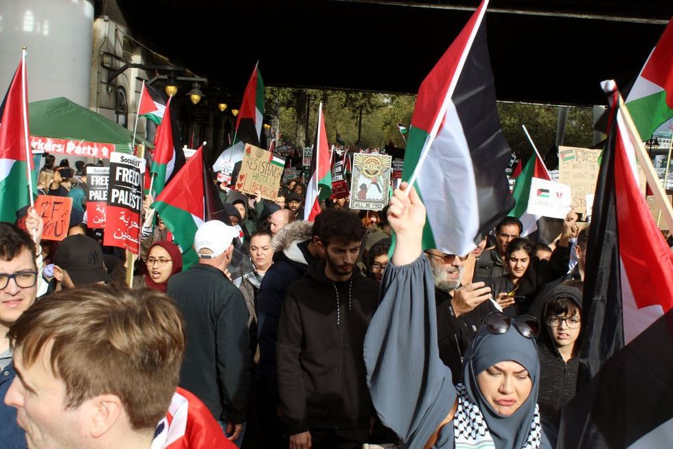 'Israel burn in hell': Transgender refugee at pro-Palestine rally charged after carrying anti-Semitic placard