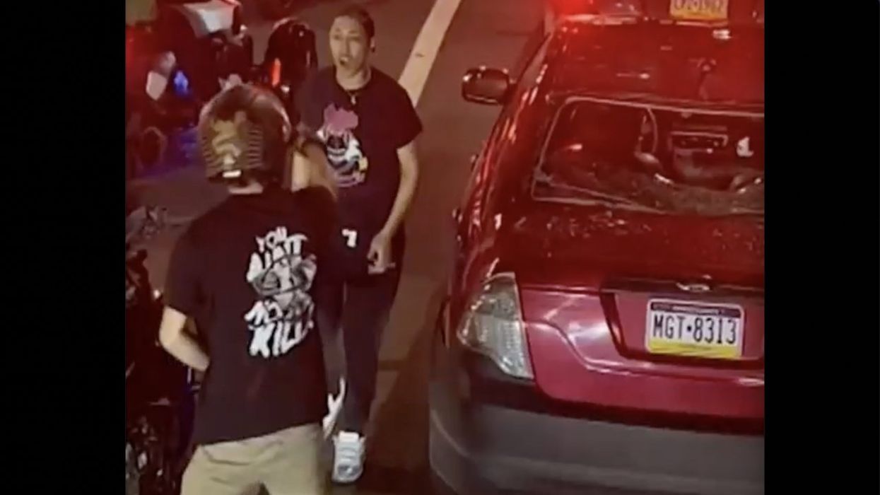 Philly cops make arrest after punk biker stomps, smashes rear window of car — with kids, 2 and 5, in back seat — points gun at mom, head-butts her