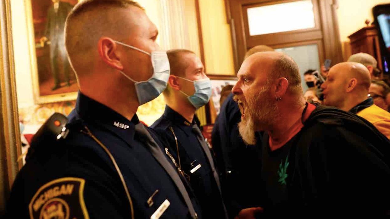 Photo of 'white supremacist' yelling at Michigan shutdown rally turns out to be fake news
