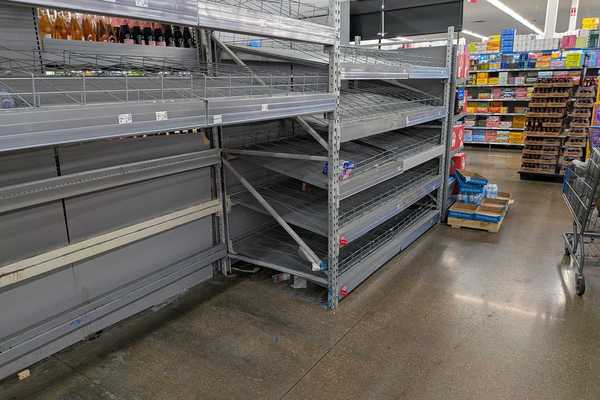 PHOTOS: Winter storm forecast turns Dallas grocery stores into a war zone