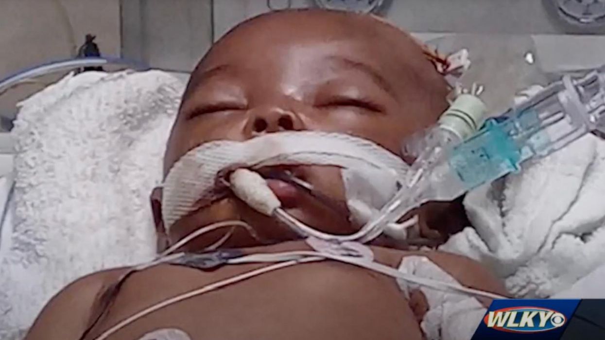 Police say newborn baby died after father threw her to the ground; mother was in hospital at the time