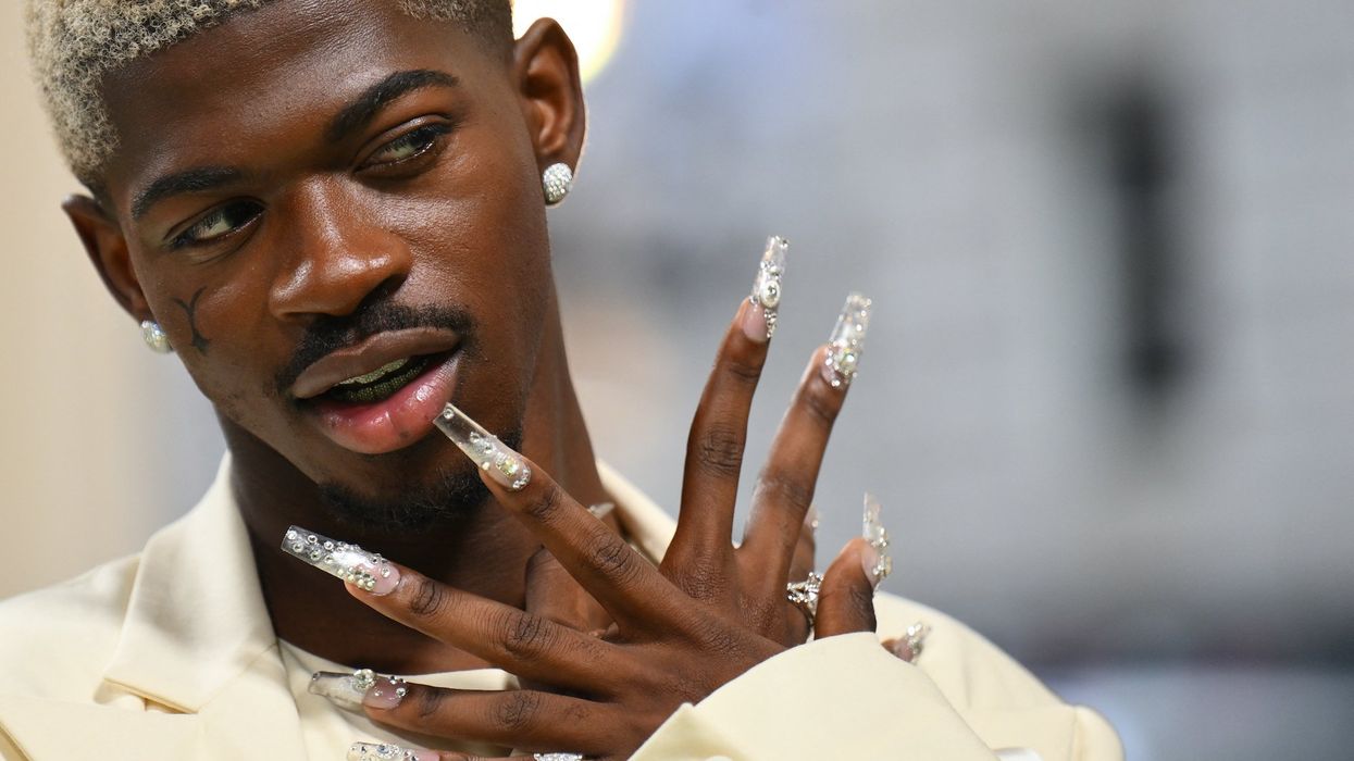 Popular rapper captured on video prancing through Los Angeles streets in his underwear before arrest and hospitalization