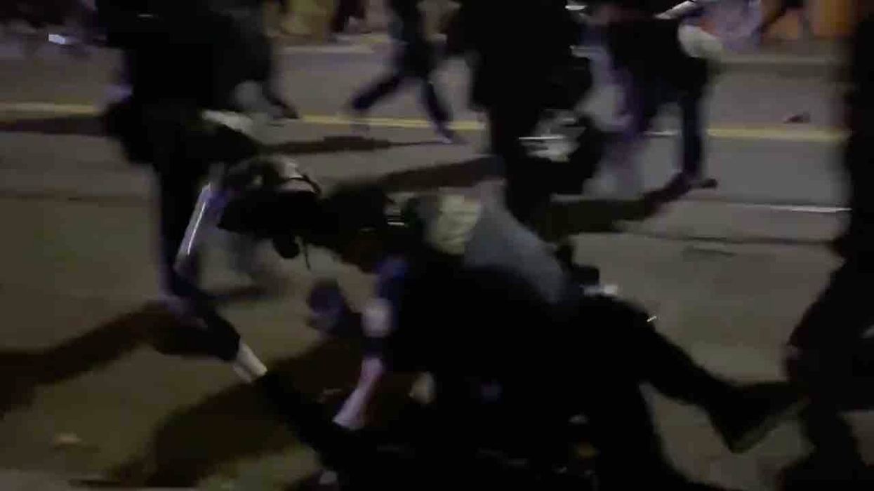 Portland cop chases Antifa rioter and tackles him to street. But when leftist pulls off cop's helmet, all bets are off.
