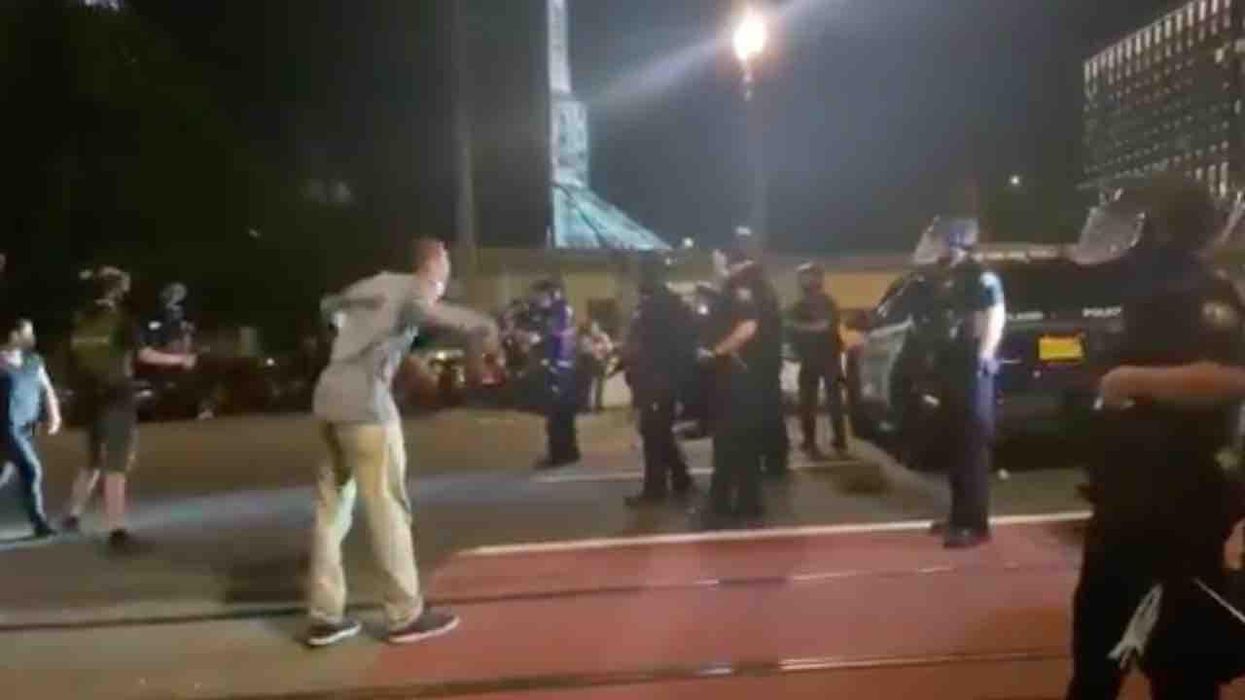Portland protesters attack cops after deadly police-involved shooting