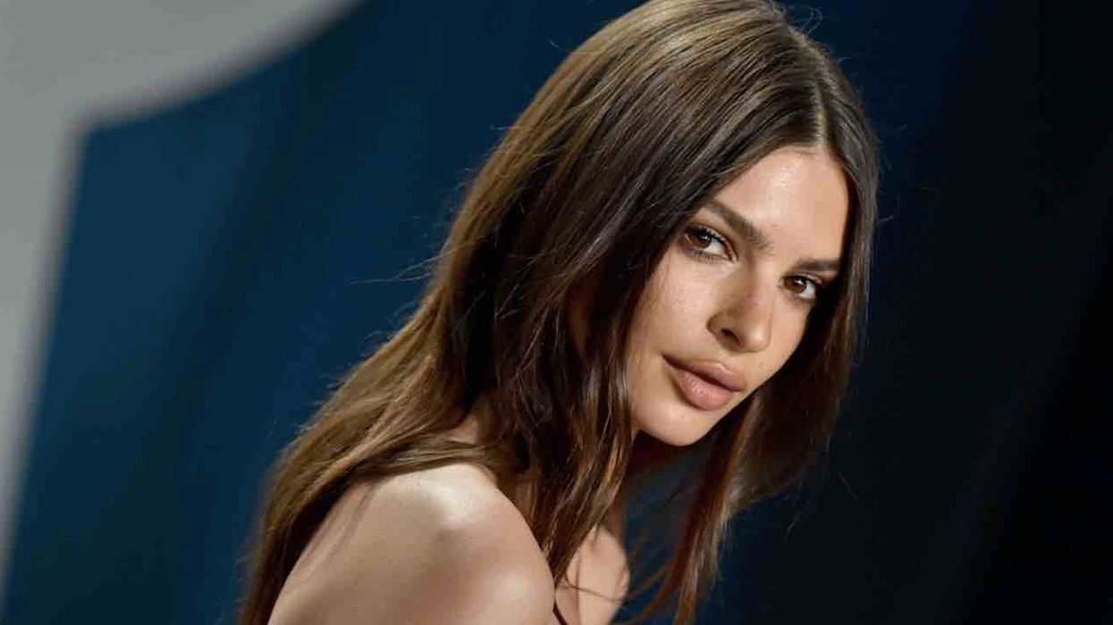 Pregnant supermodel Emily Ratajkowski says she and her husband 'won't know' baby's gender 'until our child is 18' and 'they'll let us know then'