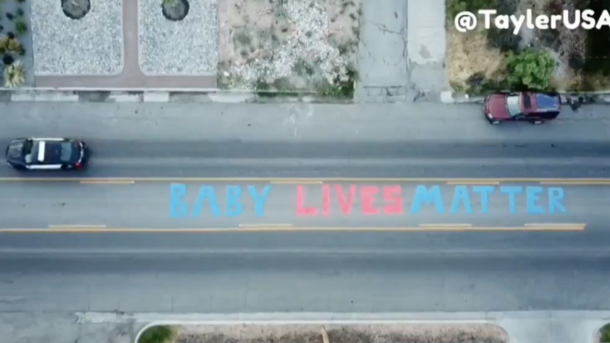 Pro-life protester paints ‘Baby Lives Matter’ mural outside of Planned Parenthood clinic