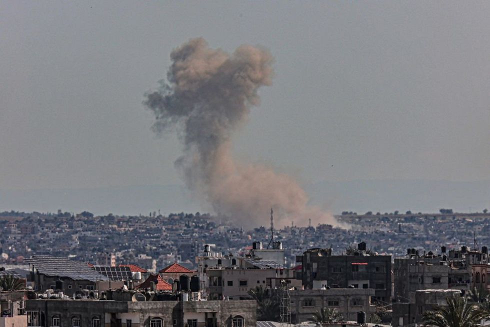 Pro-Palestinian staffers resign from opinion magazine after magazine runs piece suggesting that the war has been brutal for both sides