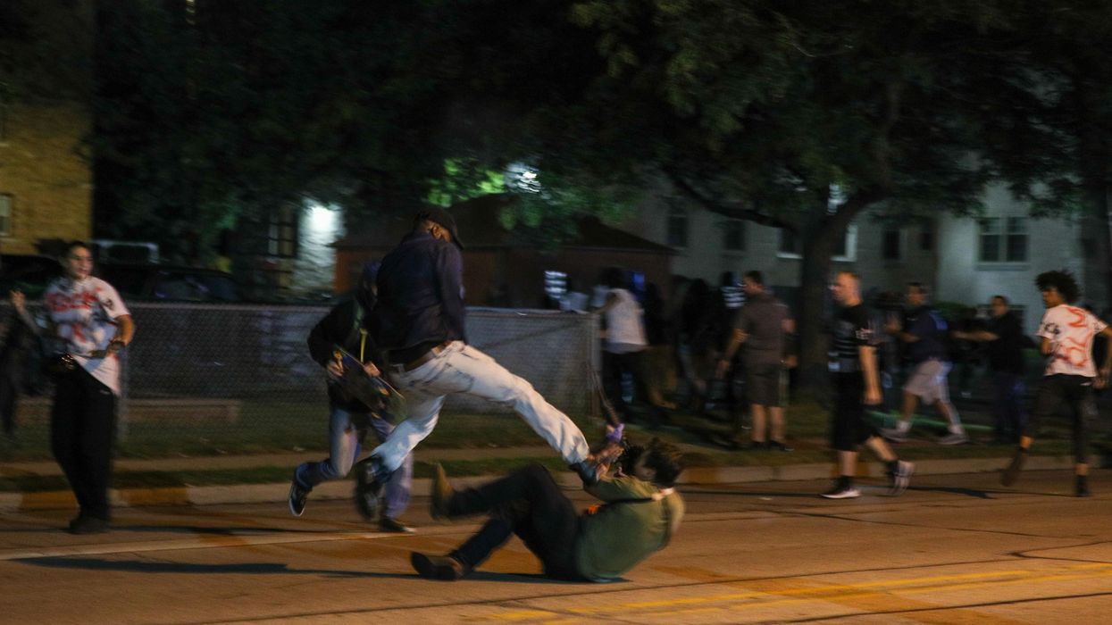 Prosecutors want to change Kyle Rittenhouse's bail conditions after he was reportedly seen legally drinking with 'Proud Boys,' flashing 'white power' sign