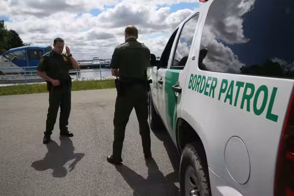 Protesters help 2 migrants escape Border Patrol after hours-long standoff on roof in New York