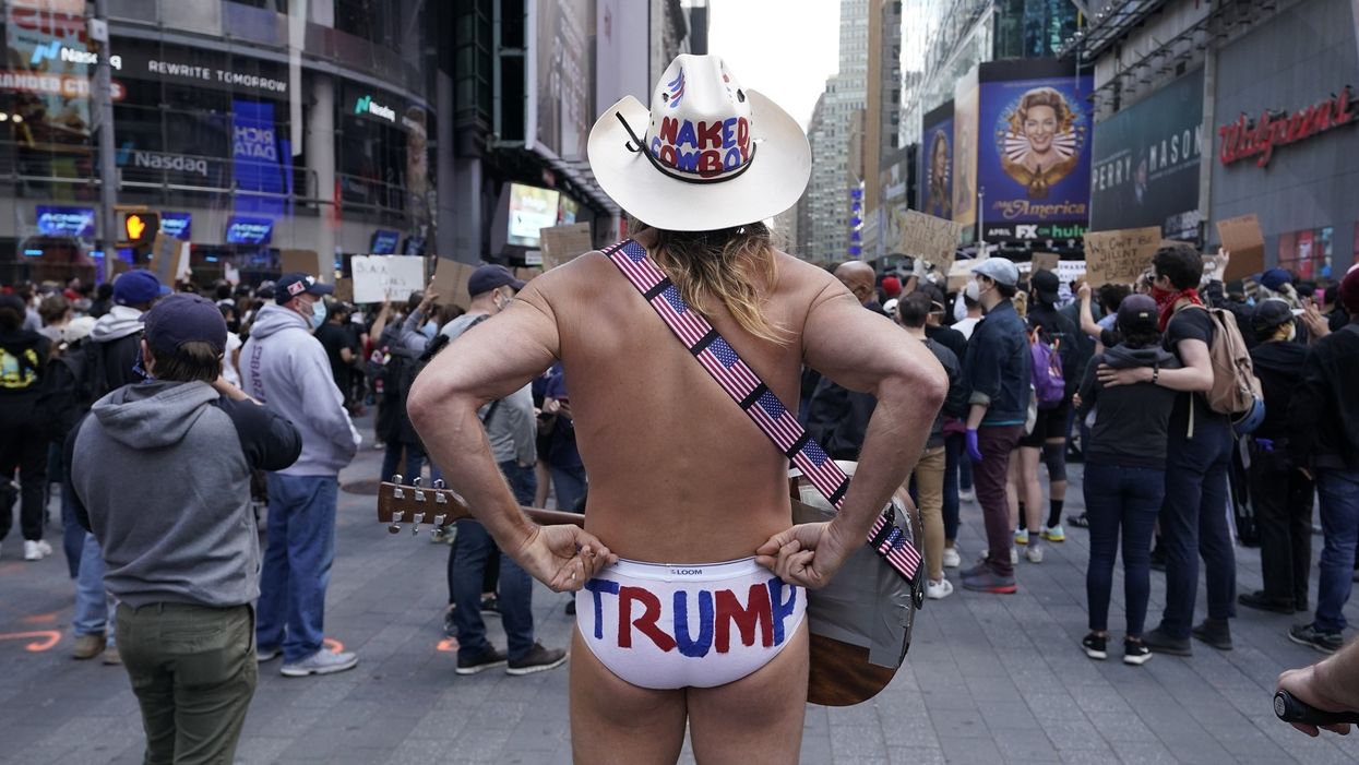 Protesters run NYC's 'Naked Cowboy' from City Hall demonstration