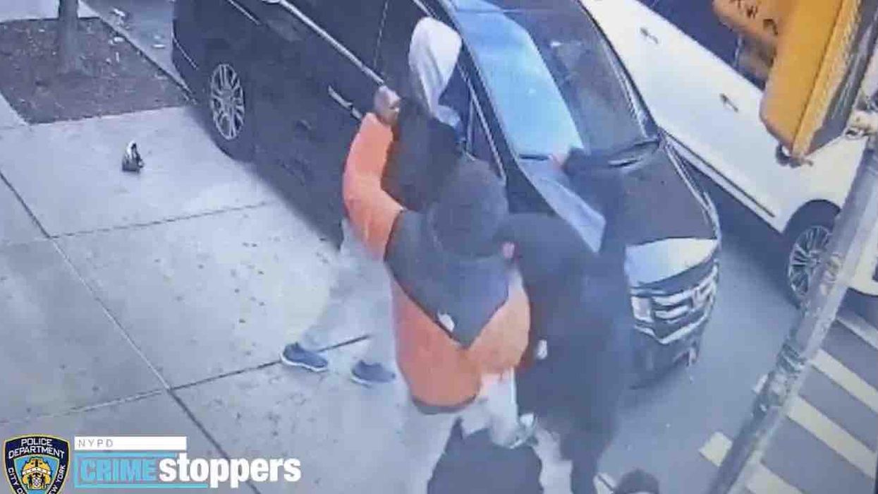 Punks caught on video ganging up on 14-year-old, punching and stomping him until he's left curled up in a ball on sidewalk. No one dares intervene.